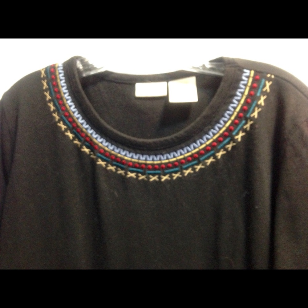 Black machine embroidered scoop neck tee.